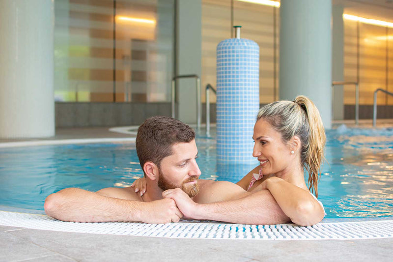 couple enjoying spa pool