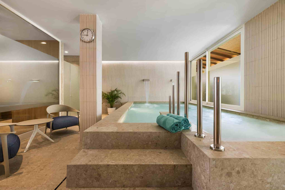 Enjoy the swimming pool at Spa Viva Sunrise in Mallorca, a serene spot for relaxation and wellness.