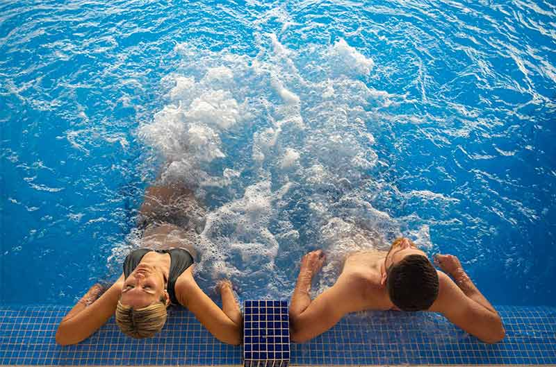 2 a couple enjoying the indoor pool at the Mallorca Wellness SPA - Gran Playa de Palma
