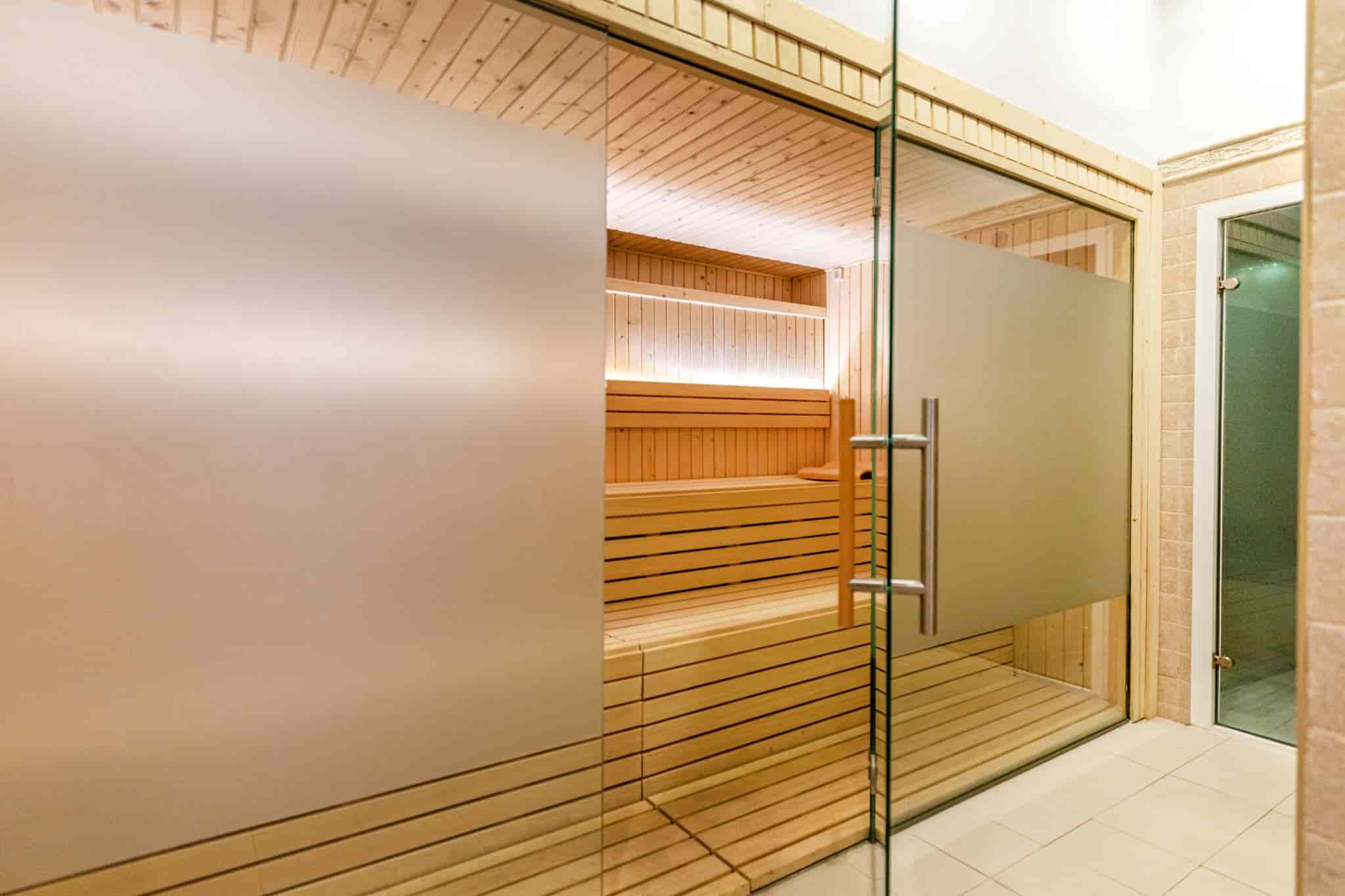 Experience the warmth and wellness benefits of the sauna at Spa Viva Cala Mesquida Suites in Mallorca, perfect for relaxation and detoxification.